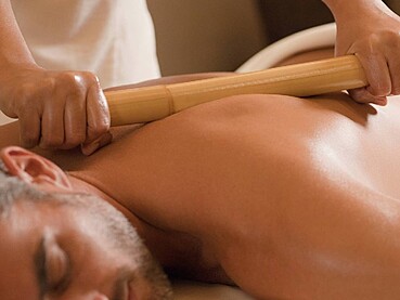 The History Behind Bamboo Massage: Ancient Craft, Modern Science, and the Psychology of Touch