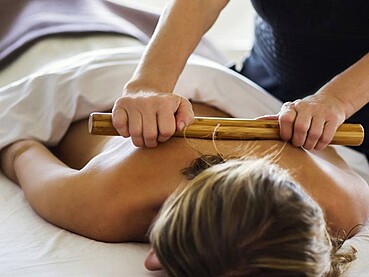 Deep Muscle Knots That Won’t Go Away? Why Signature Bamboo Massage Works Better Than Regular Massage