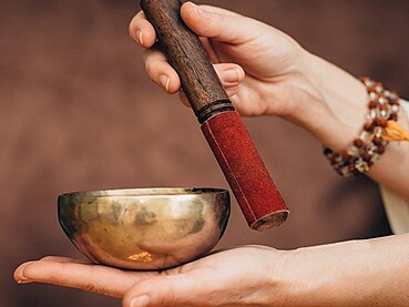 Feeling Mentally Drained in Dubai? How Tibetan Singing Bowl Massage Resets Your Body and Mind